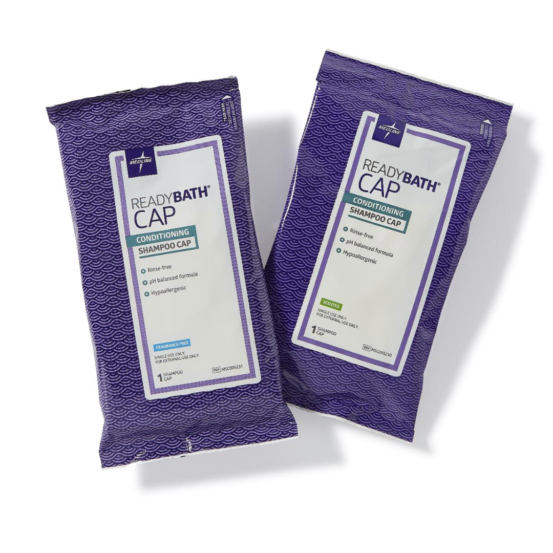 Two packs of Medline ReadyBath Rinse-Free Conditioning Shampoo Caps feature purple packaging with white text. These hypoallergenic, pH balanced caps offer convenient, disposable no-rinse shampooing.